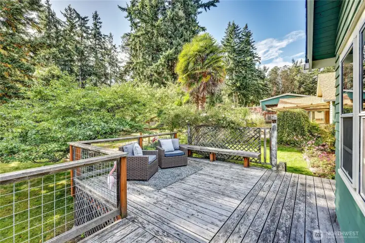 South facing deck outside draped in roses