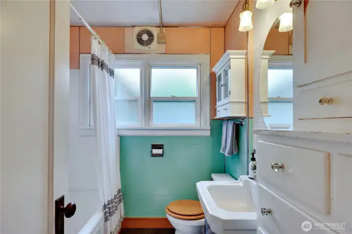 Full main bath with built in cabinets