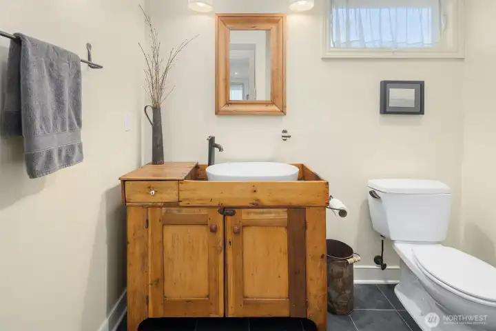 Second floor bathroom with shower for the second and third bedrooms.