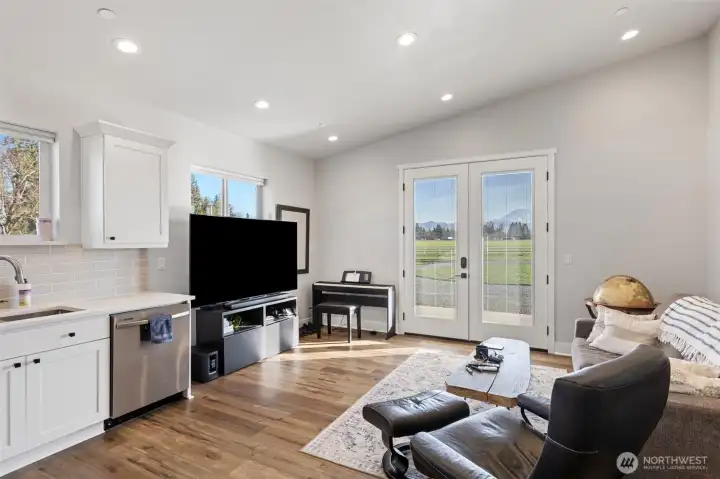 ADU: Vaulted Great Room with French Doors.