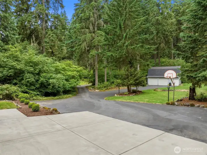 This is a great view of the front of the property, including the detached garage/shop/outbuilding