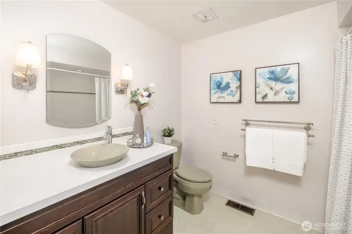 A full bath serves the secondary bedrooms, supporting everyday function on the Private Retreat Level.