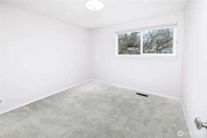 Bedroom 4 provides additional flexibility, reinforcing the home’s ability to accommodate a variety of living arrangements.