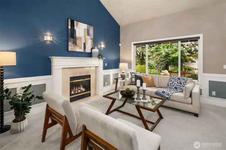 Formal living with gas fireplace.