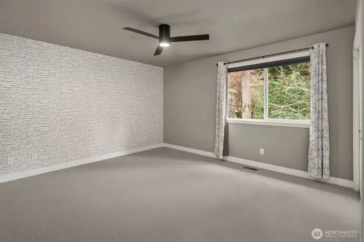 Bedroom #2 with ceiling fans.