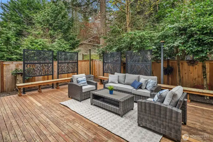 Extra large patio with mature landscaping for your ultimate backyard hangout and privacy!