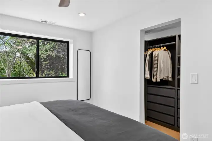 Another angle of the lower level bedroom looking towards the closet