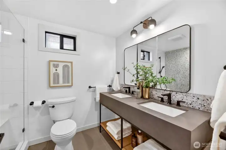 The lower level remodeled 3/4 bath is gorgeous!