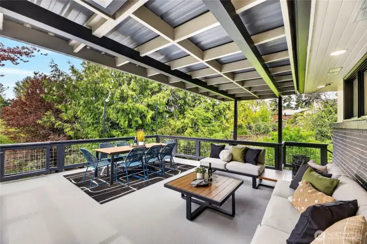 The partially covered deck is perfect for large gatherings of friends and family