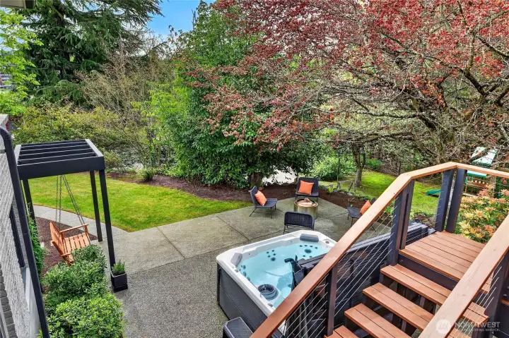 The patio space overlooking the peaceful yard and greenbelt