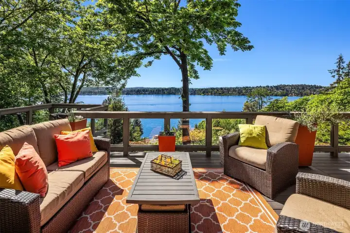 An exceptional outdoor retreat—perfectly positioned to capture sweeping lake and mountain views, with inviting lounge spaces designed for elevated entertaining and quiet moments alike.