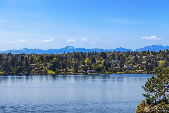 Expansive Lake Washington views stretching to the Olympic mountains beyond—an ever-changing backdrop that feels nothing short of extraordinary.