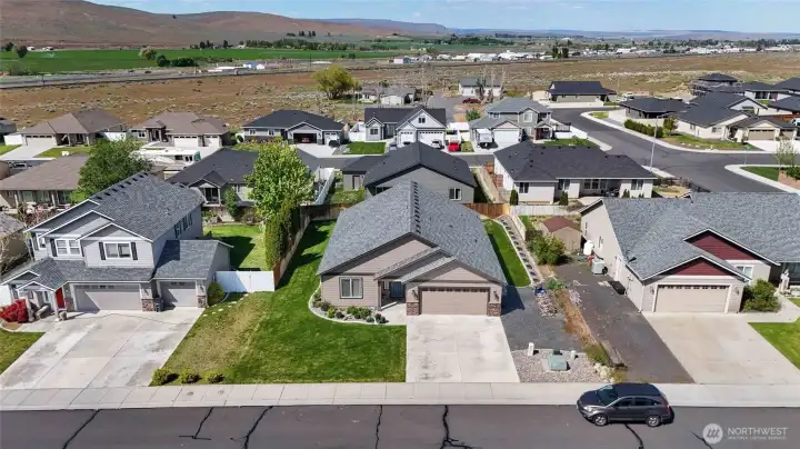 This property has a gravel space to the right for RV parking!  Look at those Ephrata hills!