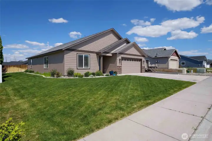 We just love the well manicured yard with curbing and a 6-foot wood fence on three sides.