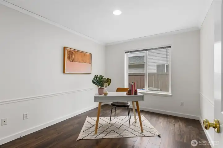 Bonus room on the main level is great for a study or craft room.