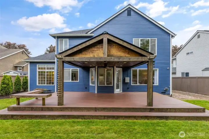 Expansive covered patio designed for year-round enjoyment, offering the perfect space for outdoor dining, entertaining, or relaxing while overlooking the private backyard.