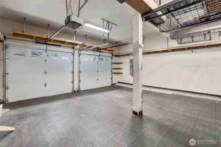 Three car garage with overhead rack storage