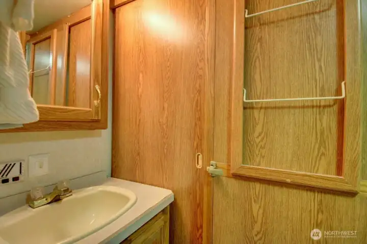 Bathroom with storage areas