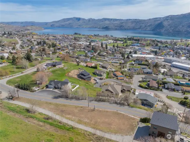 Aerial view 8 of homesite and building pad6located in the heart of Manson & overlooking Lake Chelan.