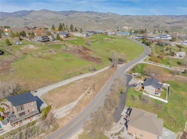 Aerial view 6 of homesite and building pad6located in the heart of Manson & overlooking Lake Chelan.