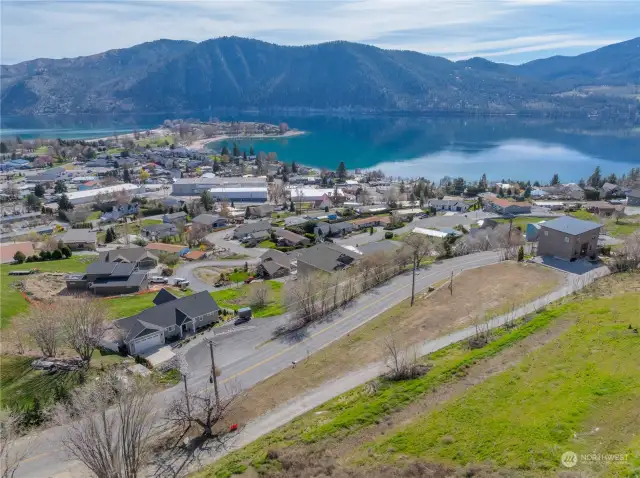 Aerial view of homesite located in the heart of Manson & overlooking Lake Chelan.