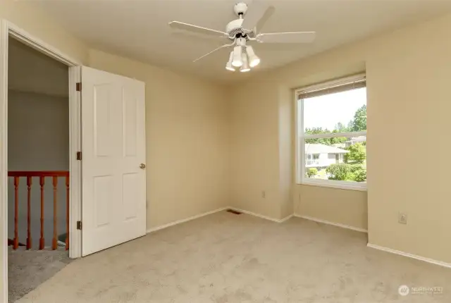 Second bedroom with neutral paint allows for any decor you choose.