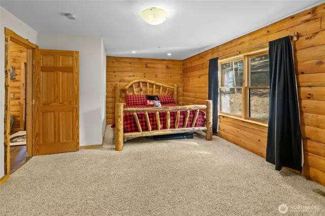 Large primary bedroom with bath ensuite and walk in closet.