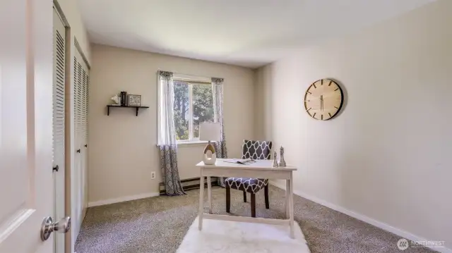 Second decent sized bedroom is perfect for home office or guest space.