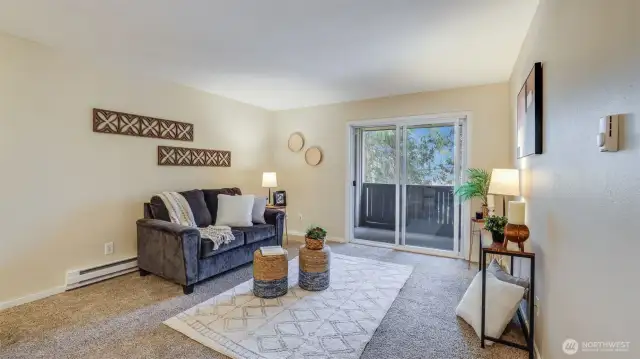 The open concept of this living room allows for optimal furniture configuration to suit your needs.