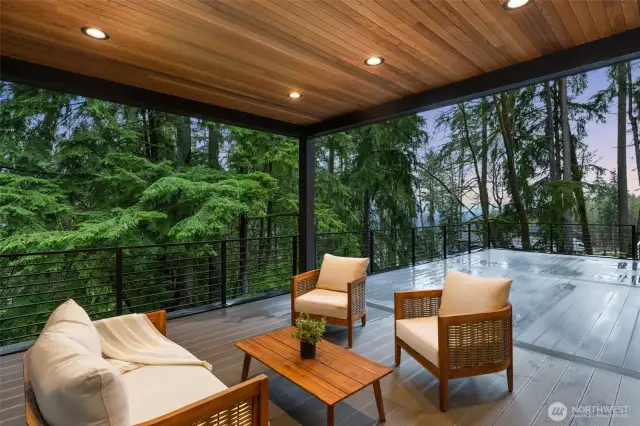 Covered patio with forest and mountain views