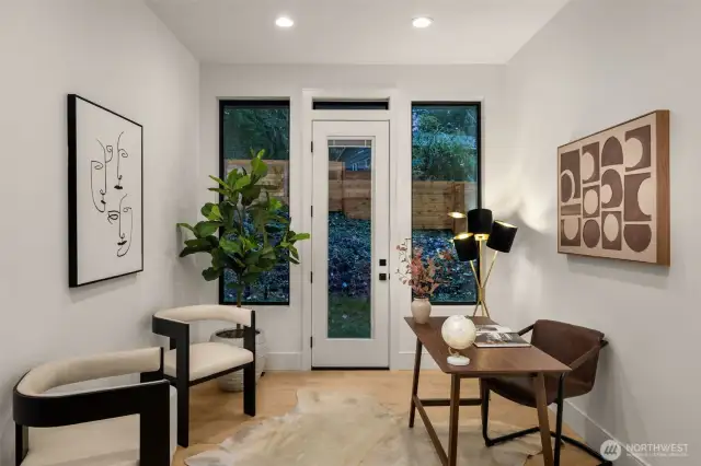 Main level office with backyard door