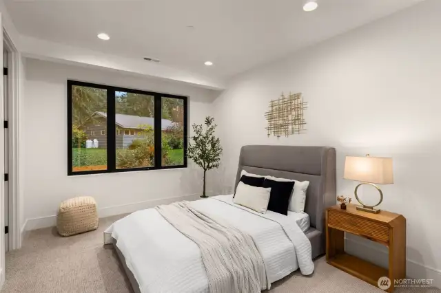 Bedroom with walk-in closet