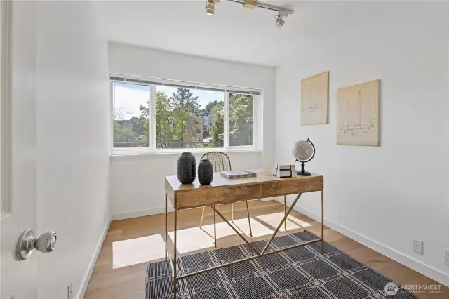 The second bedroom offers peaceful views and added space, providing endless possibilities—whether you need a guest room, home office, flex space, or creative studio. The dream is yours to design.