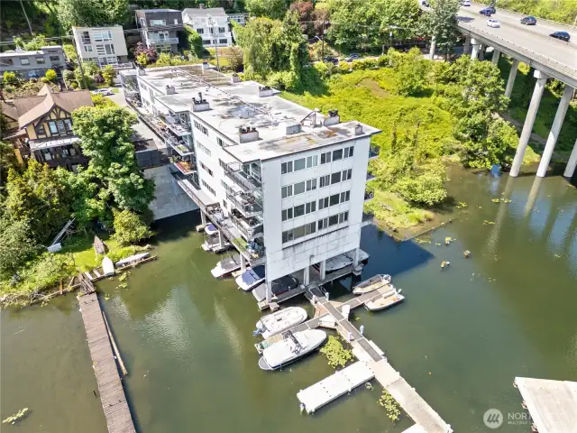 Conveniently located near I-5 and just minutes from the heart of the city, you’re close to everything. Prefer to travel by water? Your private community dock is ready for any aquatic adventure you can dream up. Plus, enjoy dedicated kayak and paddleboard storage and a spacious waterfront room perfect for relaxing or entertaining by the bay.