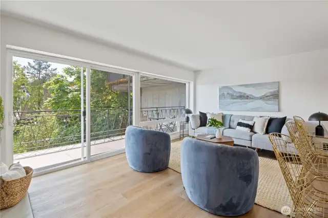 Newly installed luxury vinyl plank flooring flows throughout the home, adding a touch of warmth and visual interest with its rich texture and modern appeal.