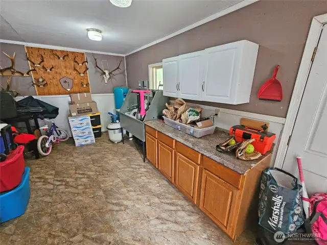 Hobby room with sink in the garage.