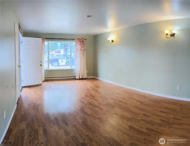 Wall sconces & picture window.