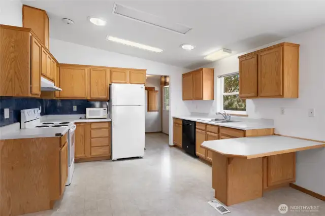 Kitchen with a lot of counter space and cabinets!