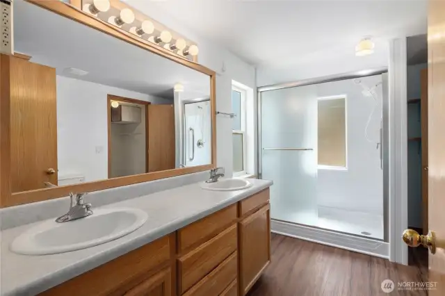 Spacious primary bath with 2 sinks and walk in shower