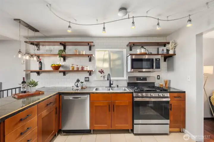 Newer appliances in this upgraded kitchen.