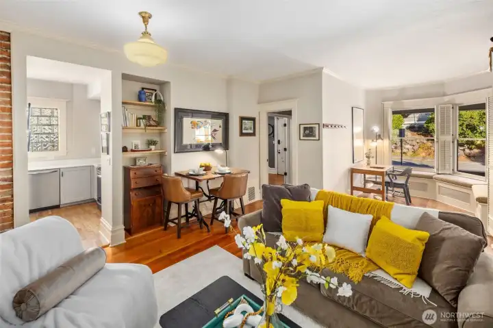 Queen of the West main floor cash flowing Airbnb living room and dining space. So much character!