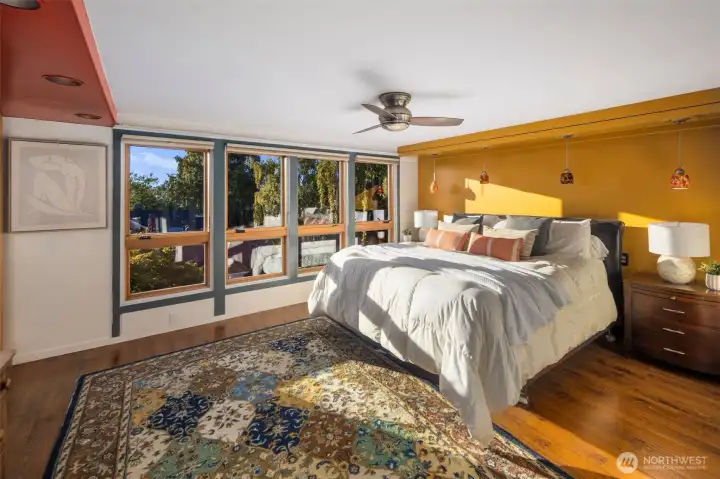 stunning city views jetted tub walk in closets with tons of built in storage. Sitting deck and rooftop deck access to take in the Seattle sunsets.