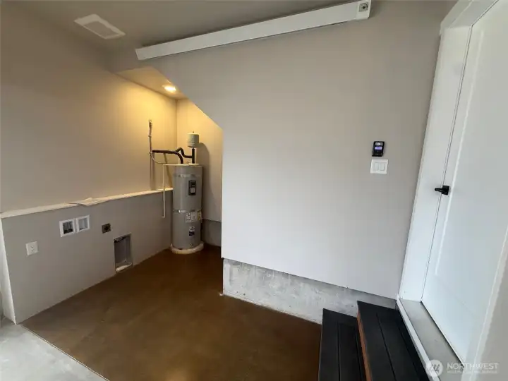 Garage with washer/dryer hook up to left