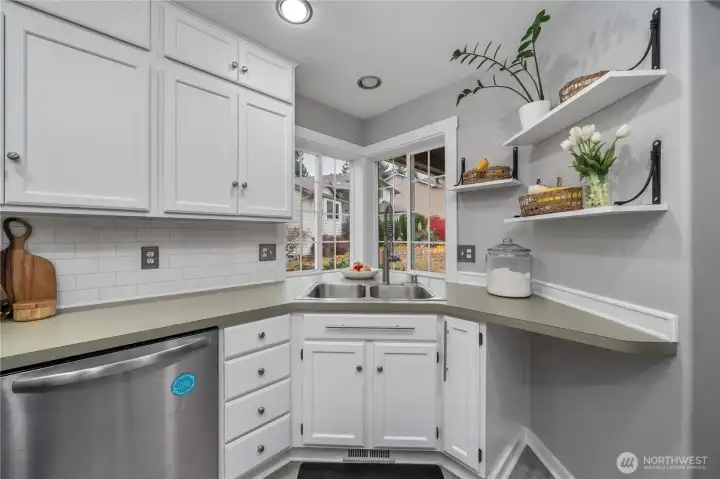Freshly painted cabinets and new backsplash!