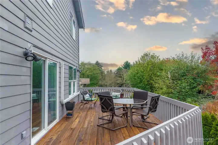 Step out onto your back deck and enjoy your morning cup of coffee with stunning views of your backyard oasis.
