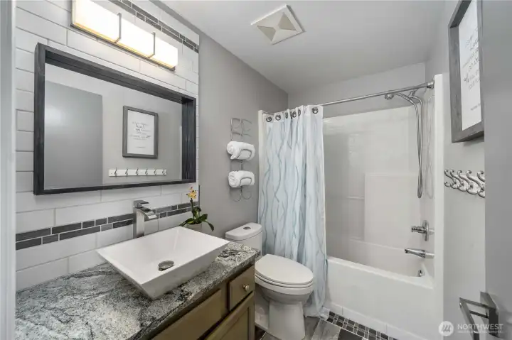 Full bathroom on the upper level.