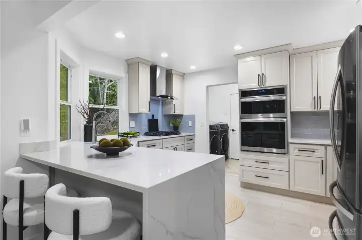 Kitchen equipped w/ Quartz countertops