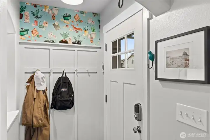 This darling wallpaper is peel & stick, for an easy change. The entryway is like a mini mudroom, and so functional!