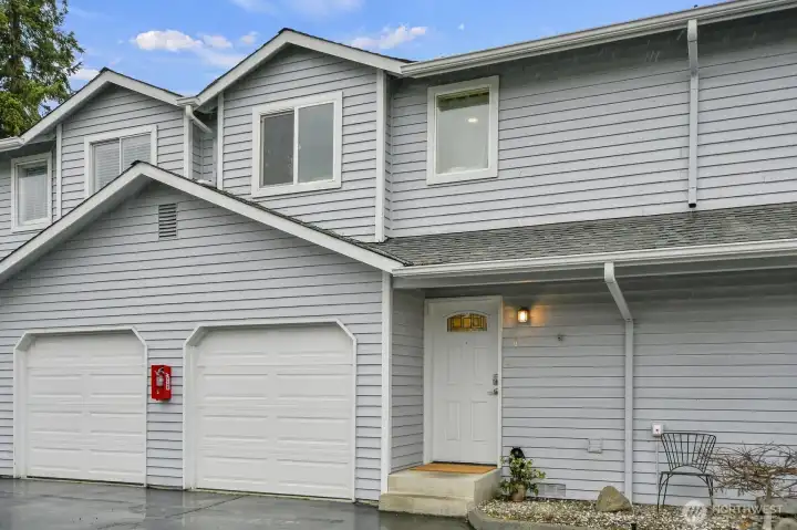 Attached single car garage and 1 assigned parking spot