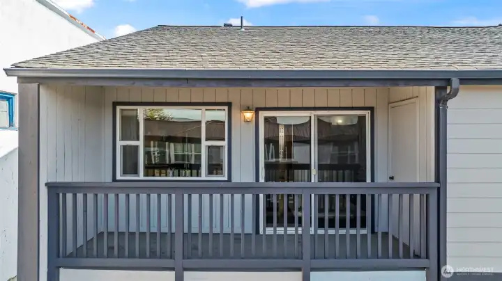 Covered balcony with partial water & mountain views!